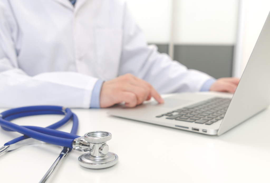 medical virtual assistant working on his laptop