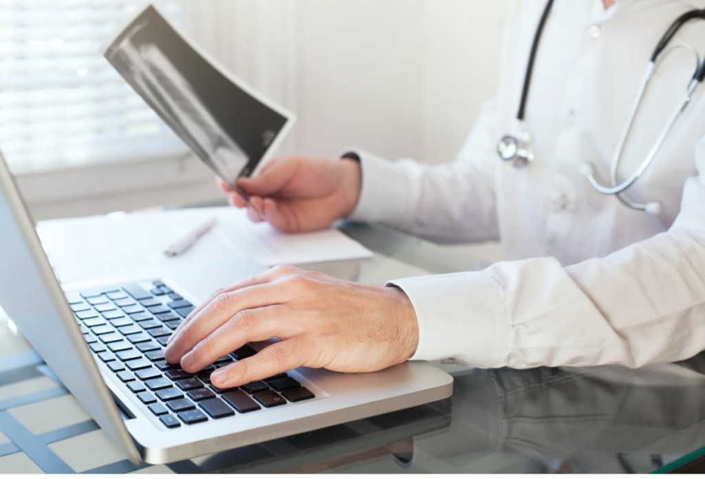 virtual assistant for healthcare industry working on his laptop