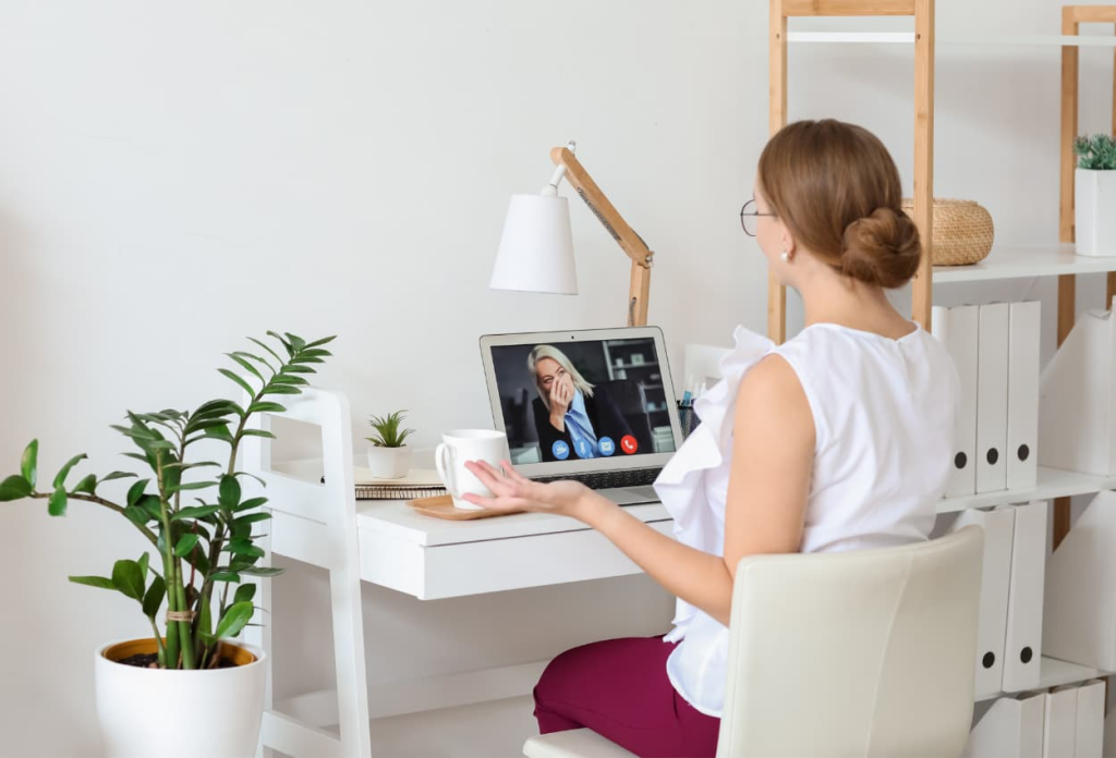 virtual assistant having meeting on her laptop