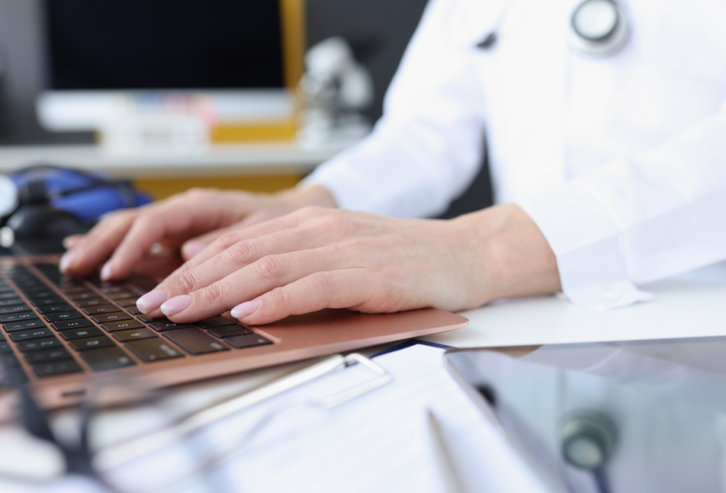 medical virtual assistant working on her laptop